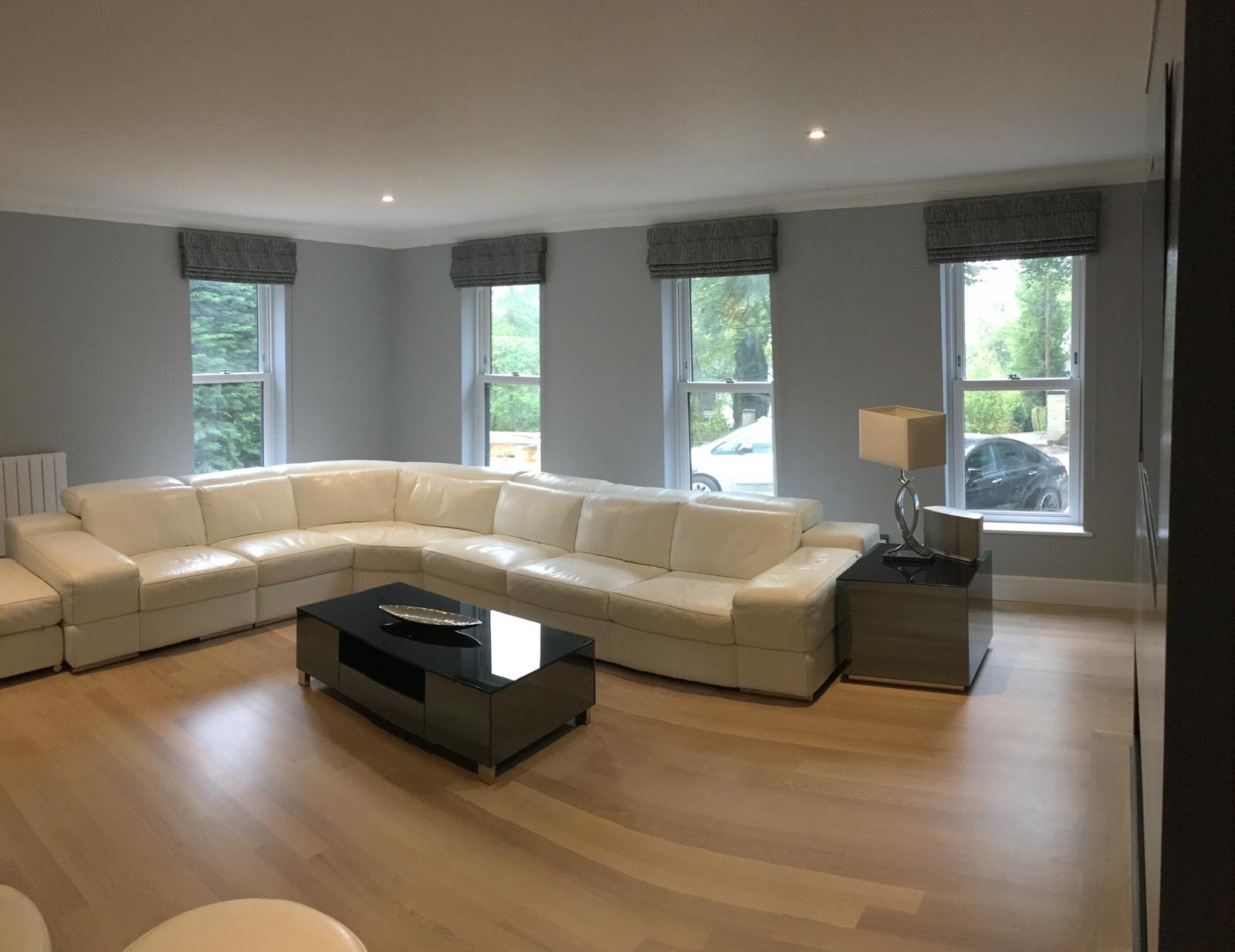 Matching Roman blinds — four-window lounge